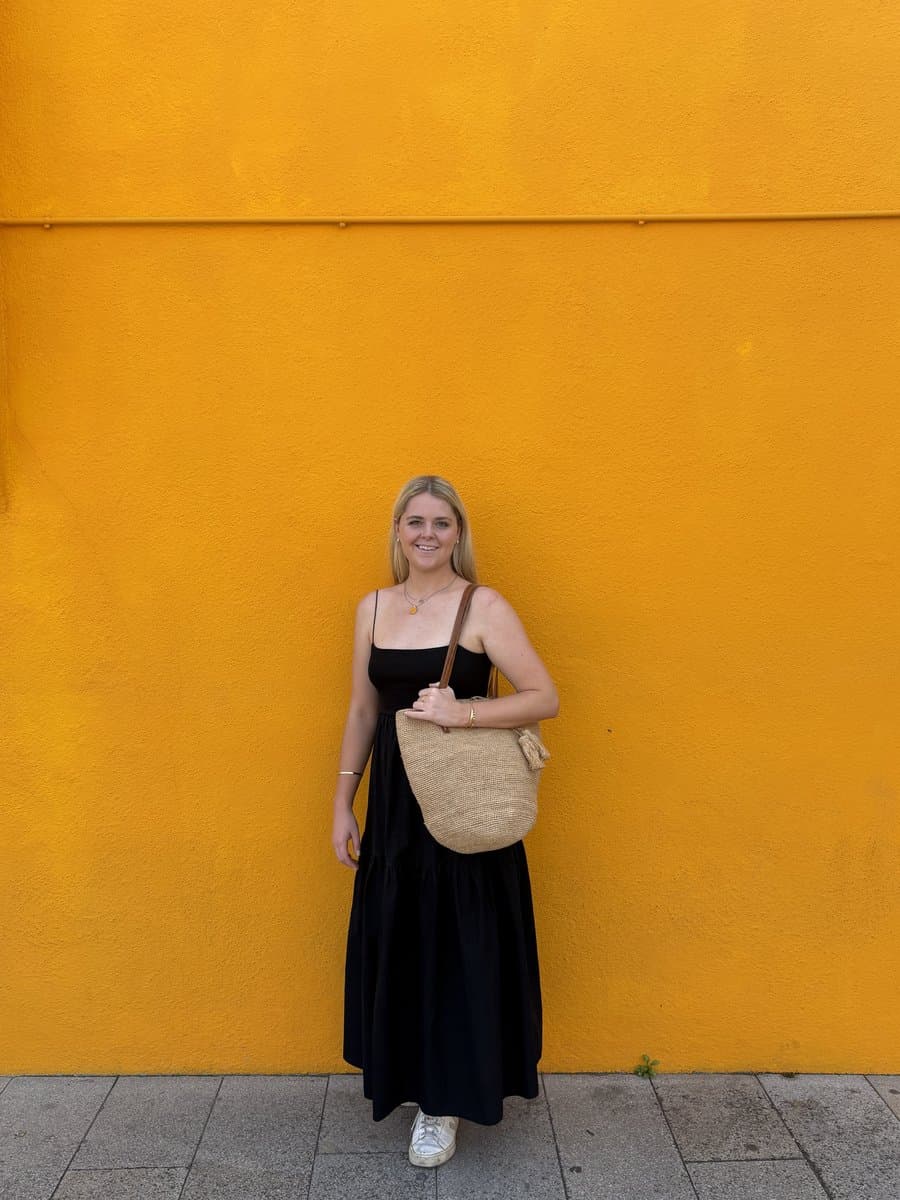 Lindsay in front of a colourful Burano wall