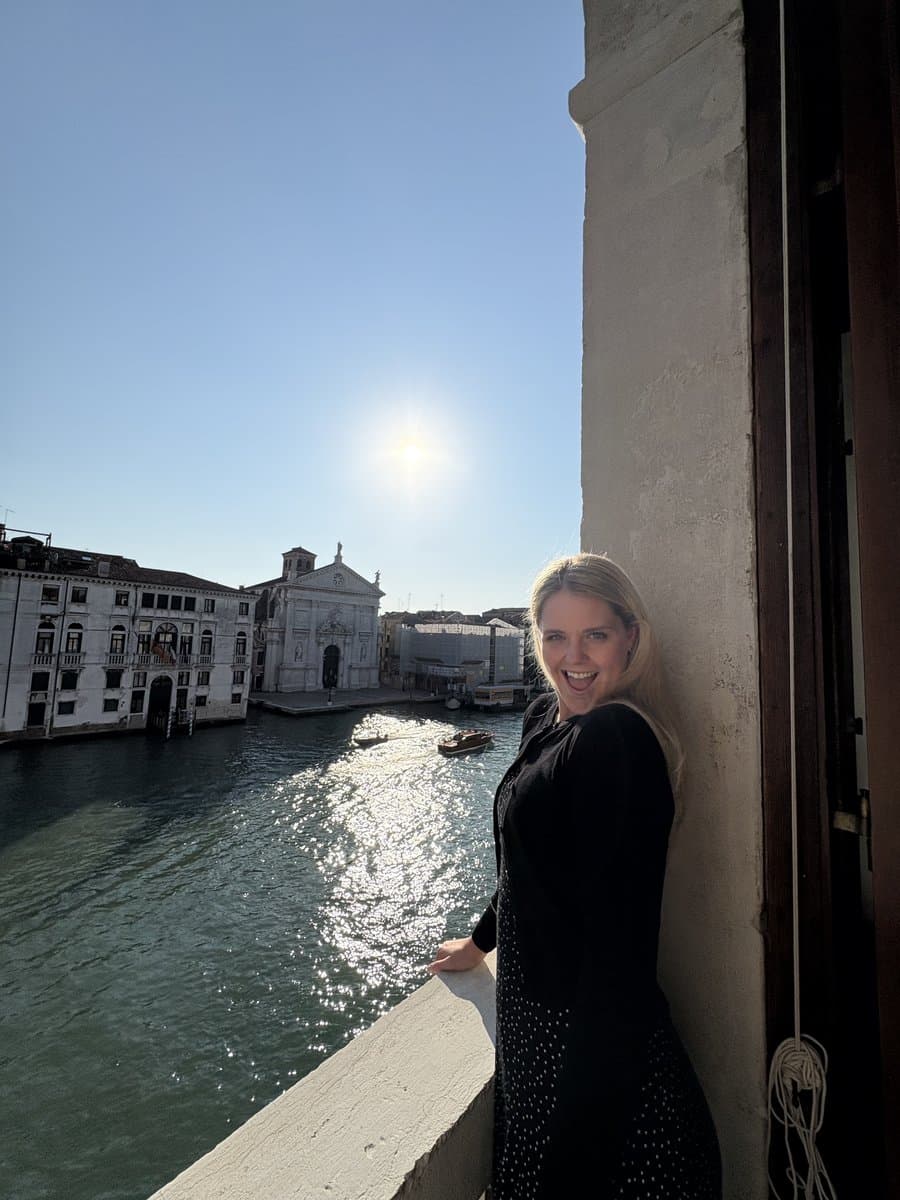 Lindsay on the balcony overlooking the Grand Canal